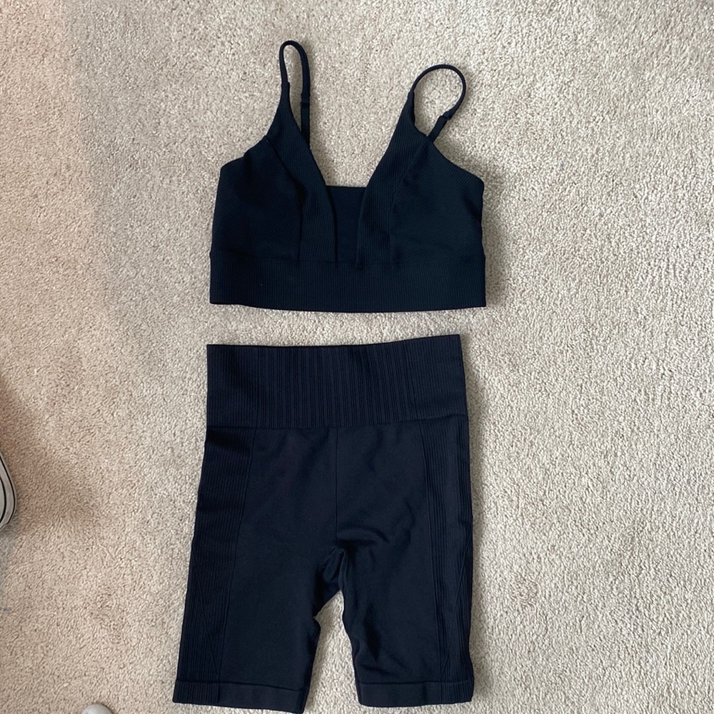 Black sports bra and black biker shorts